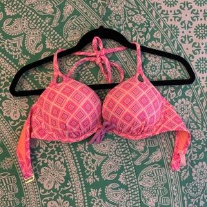 Pink, patterned, Victoria’s Secret bikini top.